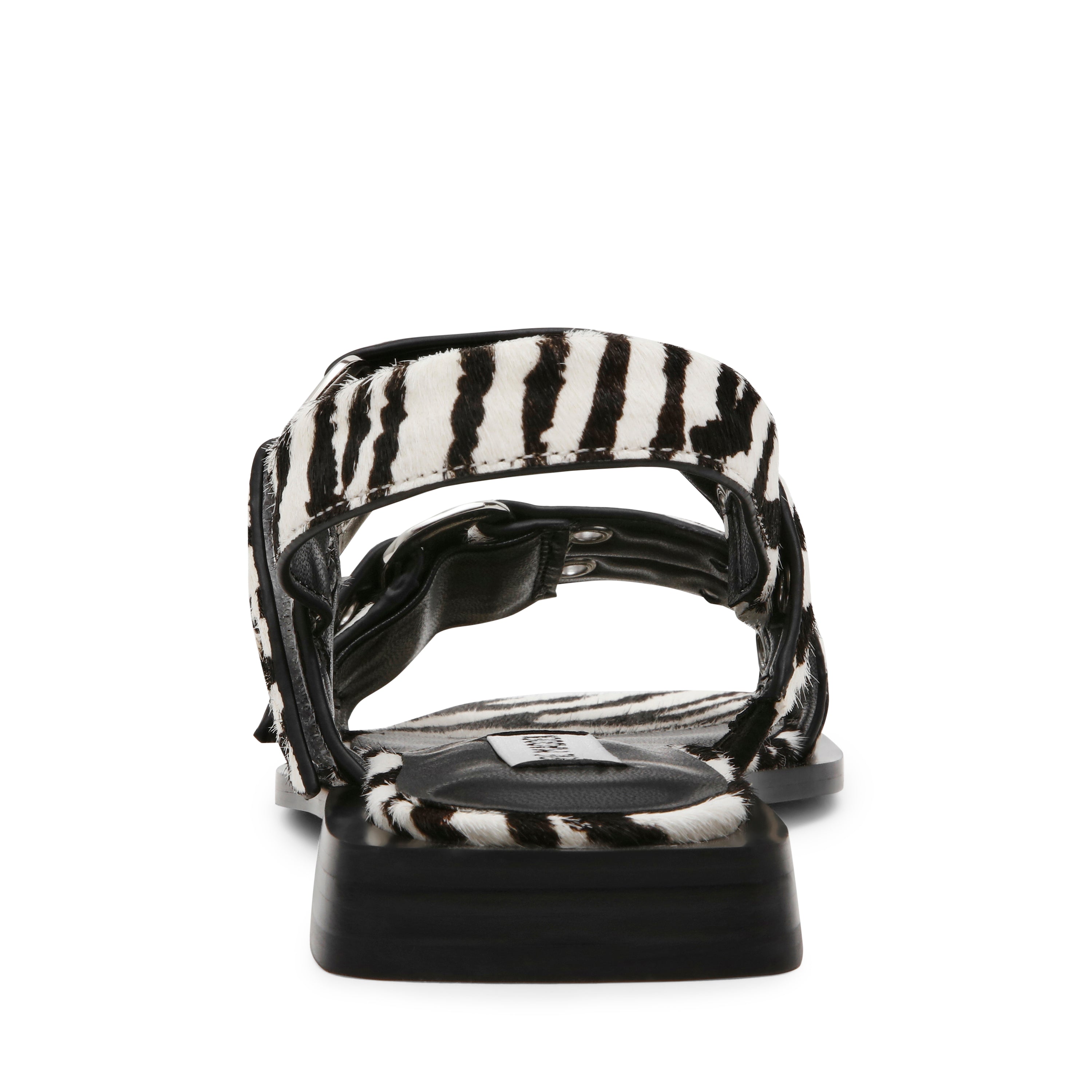 Sandalias planas Saria-L negras con blanco